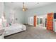 Main bedroom with king bed and access to patio at 8035 Manasota Key Rd, Englewood, FL 34223