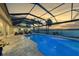 Enclosed pool and patio overlooking water at 8035 Manasota Key Rd, Englewood, FL 34223