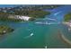 Aerial view showcasing coastal waterways, lush greenery, and serene boating routes at 261 N Gulf Blvd, Placida, FL 33946