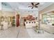 Spacious living room with high ceilings and access to the pool area at 8074 Wiltshire Dr, Port Charlotte, FL 33981