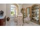 Charming breakfast nook with a glass table and four chairs at 8074 Wiltshire Dr, Port Charlotte, FL 33981
