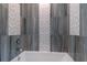 Elegant bathroom featuring a modern bathtub and stylish tile design at 8074 Wiltshire Dr, Port Charlotte, FL 33981