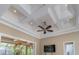 Coffered ceiling with recessed lighting and a ceiling fan at 8074 Wiltshire Dr, Port Charlotte, FL 33981