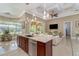 Granite kitchen island with stainless steel appliances at 8074 Wiltshire Dr, Port Charlotte, FL 33981