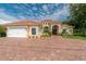 Beautiful home with tile roof, paver driveway & landscaping at 8074 Wiltshire Dr, Port Charlotte, FL 33981