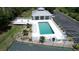 Community pool with ample deck space for lounging at 8050 Memory Ln # 101, Rotonda West, FL 33947