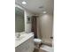 Clean bathroom with shower/tub combo and updated vanity at 8050 Memory Ln # 101, Rotonda West, FL 33947