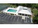 Community pool with a clubhouse and plenty of parking at 8050 Memory Ln # 101, Rotonda West, FL 33947