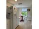 Bright kitchen boasts a breakfast nook and ample counter space at 8050 Memory Ln # 101, Rotonda West, FL 33947
