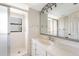 Clean bathroom with glass shower door at 6895 Manasota Key Rd, Englewood, FL 34223