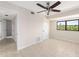 Bedroom with tan tile floor and neutral walls at 6895 Manasota Key Rd, Englewood, FL 34223