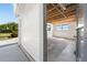 A spacious three-car garage offers ample storage and workspace, providing convenience and functionality at 6895 Manasota Key Rd, Englewood, FL 34223