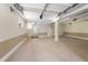 Finished garage with ample space and interior access, perfect for multiple cars and storage solutions at 6895 Manasota Key Rd, Englewood, FL 34223