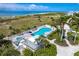 Resort-style pool with spa and beach access at 7446 Palm Island Dr # 3514, Placida, FL 33946