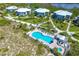 Community pool with surrounding lounge chairs and patio area at 7446 Palm Island Dr # 3514, Placida, FL 33946