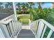 Gray steps leading down from a porch to the ground at 7446 Palm Island Dr # 3514, Placida, FL 33946