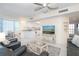 Open living area with kitchen, dining, and ocean view at 7446 Palm Island Dr # 3514, Placida, FL 33946