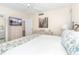 King bedroom with coastal decor and built-in dresser at 7446 Palm Island Dr # 3514, Placida, FL 33946