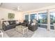 Spacious living room with leather sofas and ocean view at 7446 Palm Island Dr # 3514, Placida, FL 33946