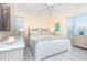 Spacious bedroom with a king-size bed and ocean-themed decor at 7446 Palm Island Dr # 3514, Placida, FL 33946