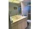 Clean bathroom with vanity, toilet, and shower at 18122 Windswept Ave, Port Charlotte, FL 33948