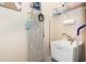 Convenient laundry area with utility sink and storage shelves at 8580 Eagle Bay Ct, North Port, FL 34287