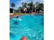 Inviting swimming pool, perfect for relaxation and entertainment at 745 Coral Way, Englewood, FL 34223