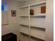 Empty white shelving unit in a spare room at 745 Coral Way, Englewood, FL 34223