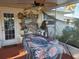 Screened porch with nautical decor and outdoor table at 745 Coral Way, Englewood, FL 34223