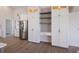 Modern kitchen with white cabinets and a large island at 495 Coral Creek Dr, Placida, FL 33946