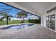 Screened pool and spa with a gorgeous golf course view at 495 Coral Creek Dr, Placida, FL 33946