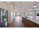Bright kitchen boasts stainless steel appliances, an island, and views to the backyard at 495 Coral Creek Dr, Placida, FL 33946