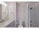 Updated bathroom with a vanity, toilet, and shower at 495 Coral Creek Dr, Placida, FL 33946