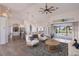 Open living room with kitchen and pool view at 495 Coral Creek Dr, Placida, FL 33946