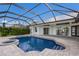 Screened pool and spa with a gorgeous golf course view at 495 Coral Creek Dr, Placida, FL 33946