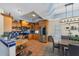 Kitchen with wood cabinets, stainless steel appliances, and a tiled backsplash at 7192 N Paragon Rd, North Port, FL 34291