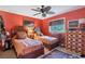 Guest bedroom with twin beds and tropical decor at 120 Barracuda Dr, Placida, FL 33946