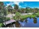 Waterfront property with private dock and lush landscaping at 120 Barracuda Dr, Placida, FL 33946