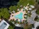 Community pool with surrounding lounge area at 11708 Anglers Club Dr # 125, Placida, FL 33946