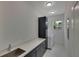 Laundry room with washer, dryer, and built-in cabinets at 118 Green Pine Park, Rotonda West, FL 33947