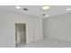 Bright bedroom with spacious closet and marble flooring at 118 Green Pine Park, Rotonda West, FL 33947