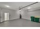Garage with epoxy floor and extra storage space at 118 Green Pine Park, Rotonda West, FL 33947