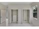 Well-lit bedroom with double closets and marble floors at 118 Green Pine Park, Rotonda West, FL 33947