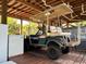 Under house golf cart garage with mini fridge at 8934 Gulf St, Placida, FL 33946