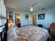 Bedroom with patchwork quilt and ensuite bathroom at 8934 Gulf St, Placida, FL 33946
