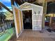 Convenient storage shed with workshop inside at 8934 Gulf St, Placida, FL 33946