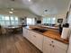 Open kitchen with butcher block countertops and island at 8934 Gulf St, Placida, FL 33946