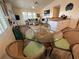 Small dining area with glass-top table and wicker chairs at 8934 Gulf St, Placida, FL 33946