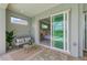 Covered patio with seating area and view of the Primary bedroom and pool at 777 Boundary Blvd, Rotonda West, FL 33947