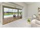 Relaxing pool and patio area accessible through sliding glass doors at 777 Boundary Blvd, Rotonda West, FL 33947
